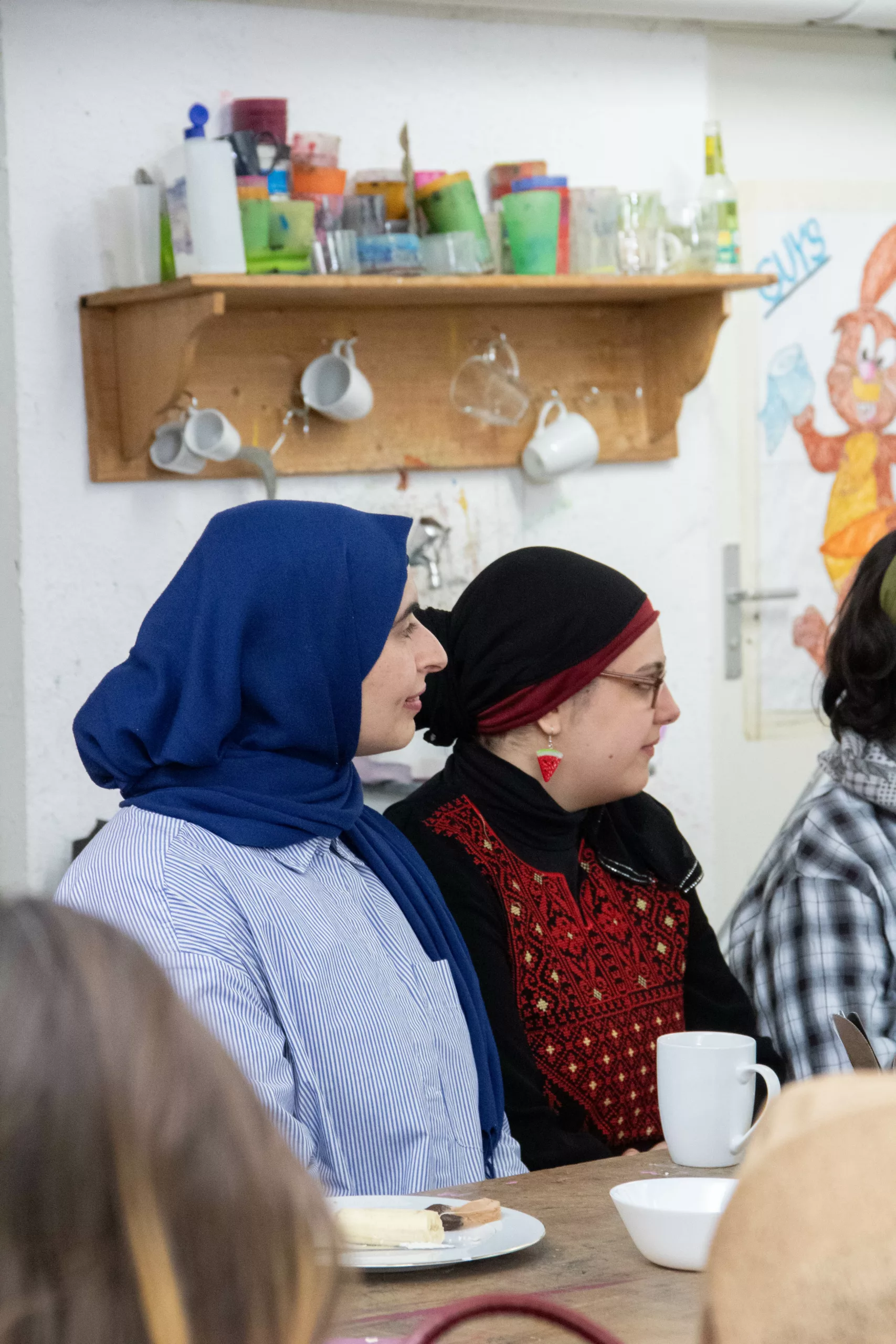 Two women chatting at the table