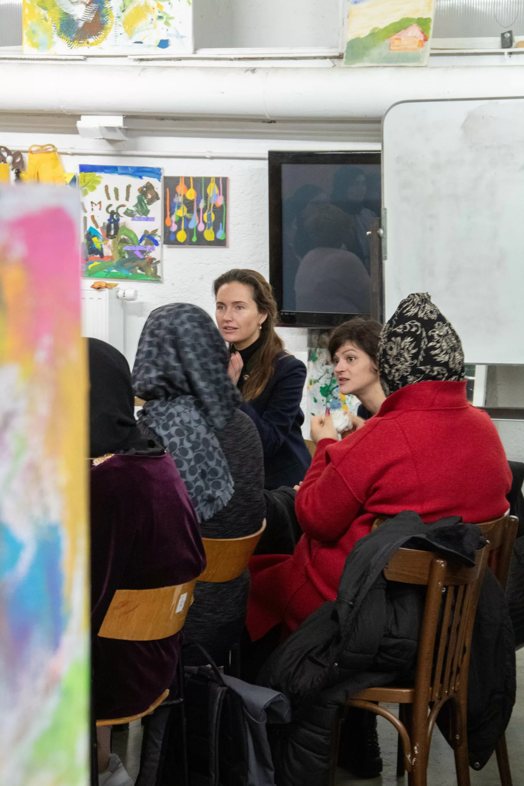 Women listening in the women's café